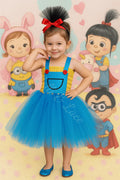 Agnes's Magical Unicorn Adventure Tutu Dress & Headband Set featuring a bright blue tutu dress with overall-inspired details, red button accents, and a matching black tulle bow headband for girls.