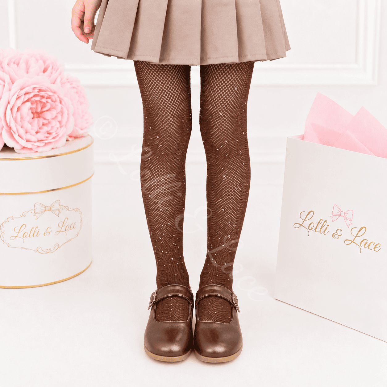 Chocolate brown rhinestone fishnet tights for girls with sparkling crystal accents, perfect for costumes, dance recitals, holiday outfits, and boutique dress-up.