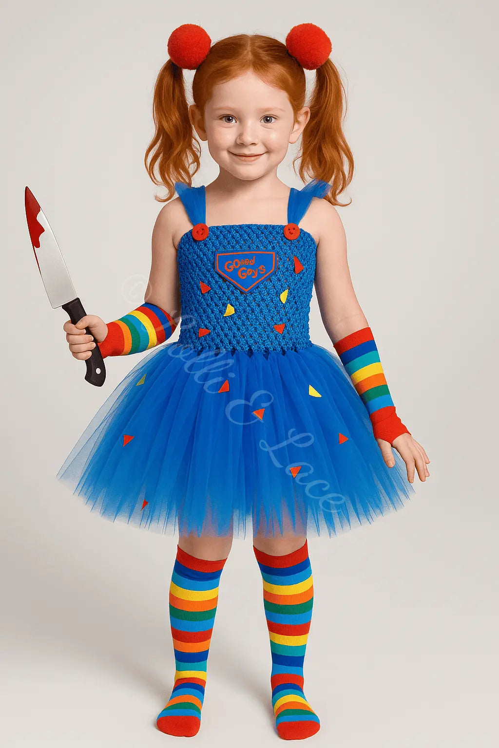 Girl wearing a blue tutu dress with rainbow striped socks and arm warmers inspired by a spooky doll costume for Halloween and dress-up play.