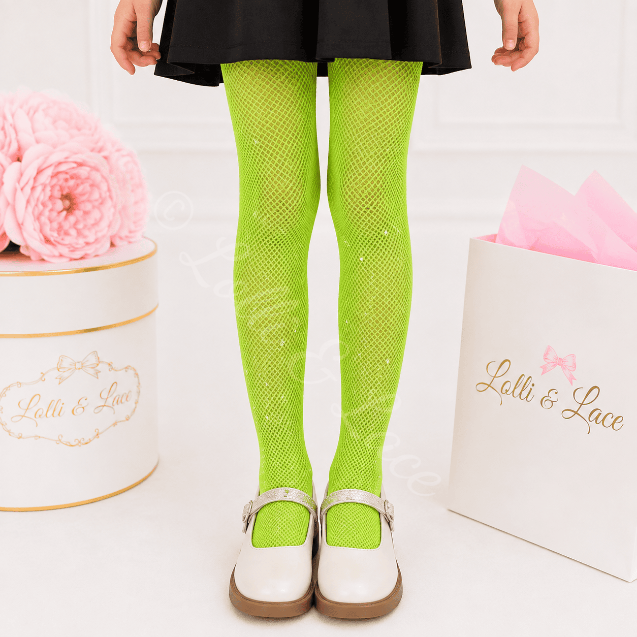 Emerald green rhinestone fishnet tights for girls featuring sparkling crystal accents, perfect for fairy costumes, Halloween, dance recitals, parties, and boutique outfits.