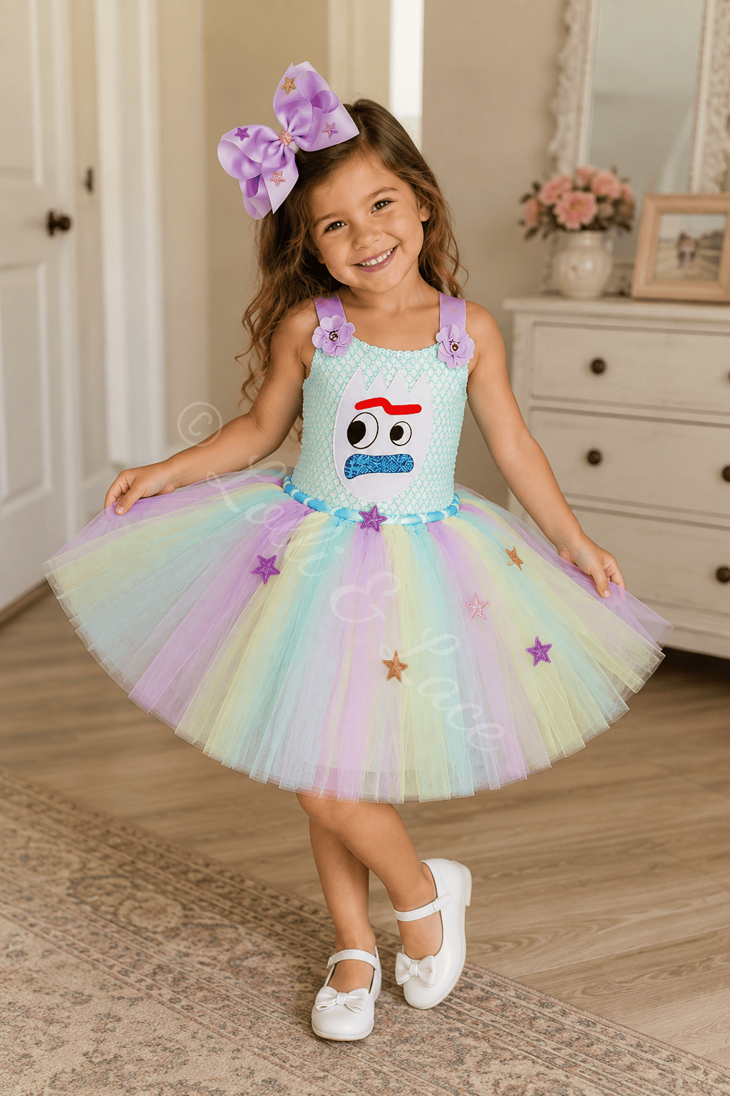 Girl wearing a pastel rainbow Forky and Karen Toy Story tutu dress with sparkly star details and a matching lavender hair bow.