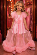 Girl wearing a Glinda inspired pink princess costume with short dress and sheer floor-length bubble overlay trimmed with ruffles.