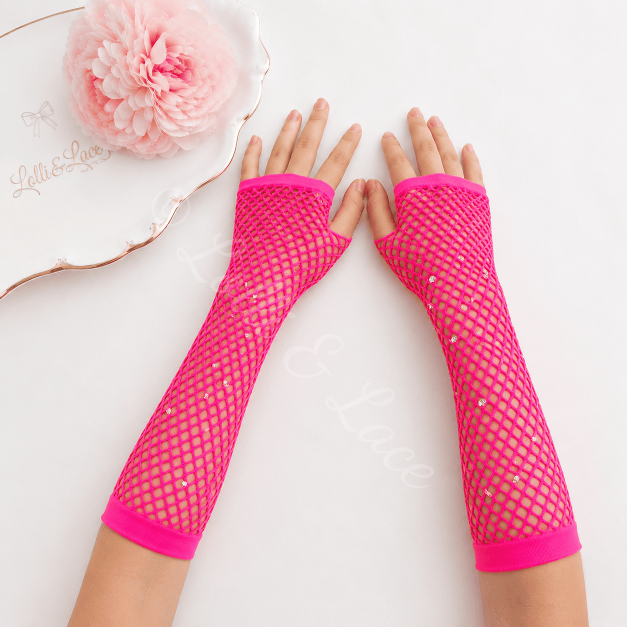 Hot pink rhinestone fishnet fingerless gloves for girls with sparkling crystal accents, perfect for dance, Halloween costumes, pop star outfits, cosplay, birthdays, and dress-up.