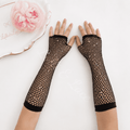 Black fishnet fingerless gloves for girls with sparkling rhinestone accents, perfect for Halloween costumes, cosplay, dance recitals, princess outfits, villain costumes, and dress-up.