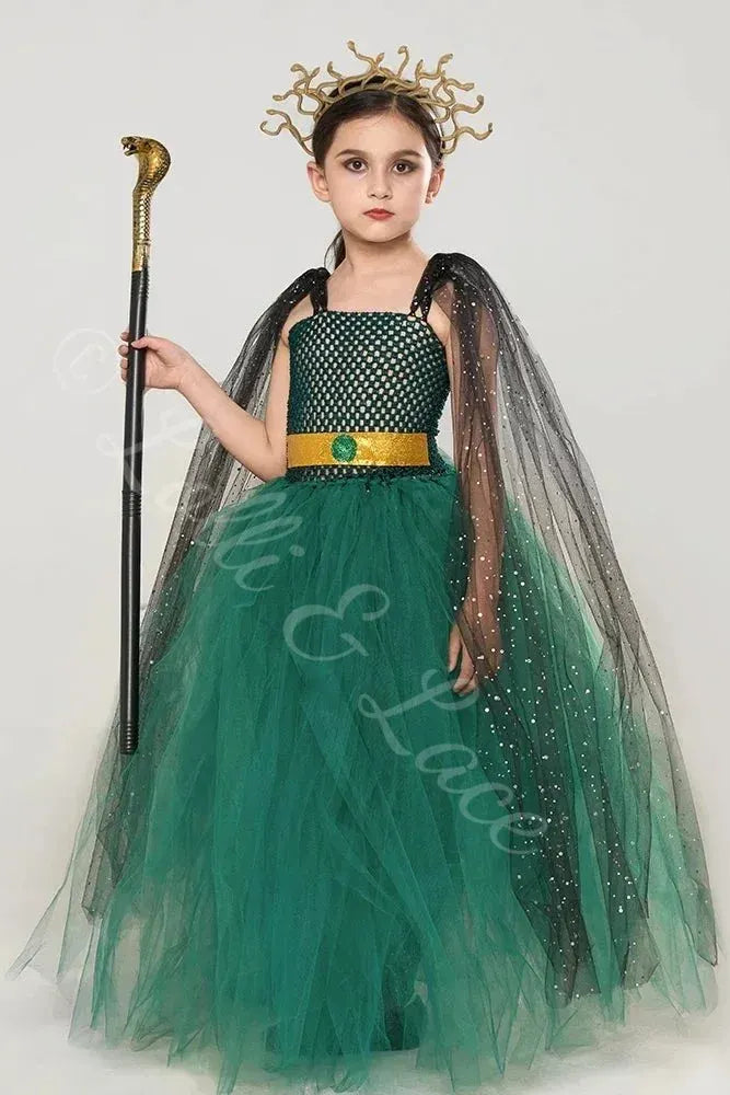 Mystic Medusa Goddess Costume Dress Set for Girls featuring an emerald green tulle dress with a snake crown, sparkling cape, and snake staff.