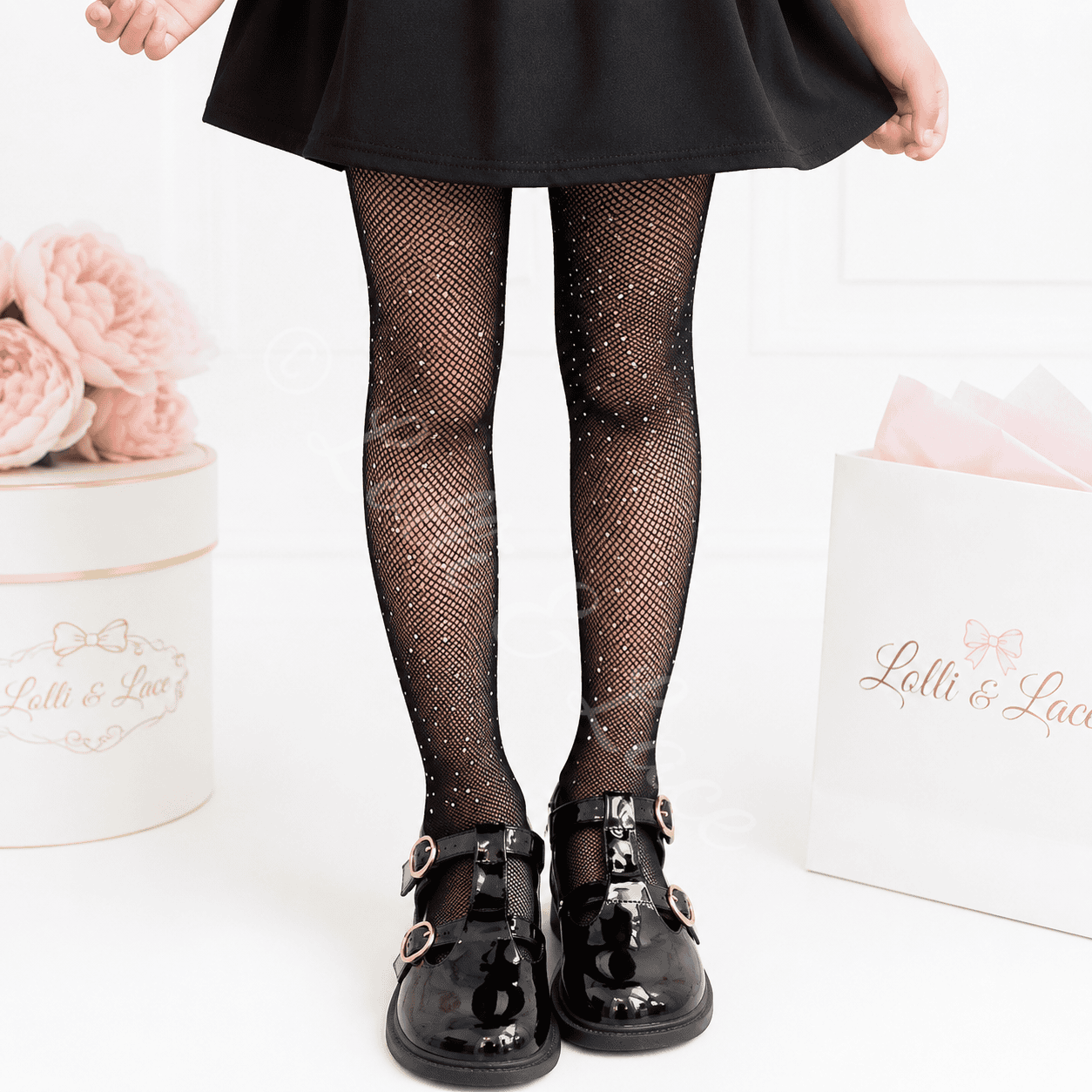 Black sparkle rhinestone fishnet tights for girls, stretchy glitter pantyhose perfect for costumes, dress-up, dance, and special occasions.