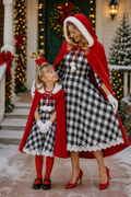 Cindy Lou inspired Mommy and Me Christmas costume with matching checkered dresses and red hooded capes