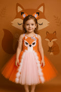 Girl wearing Foxy Fairytale Tutu Dress and fox ear headband with fluffy orange and pink tutu skirt for Halloween costume and dress-up play.
