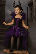 Girl wearing Maleficent Mistress of Magic black tutu dress costume with wings and horn headband for Halloween and dress-up play.