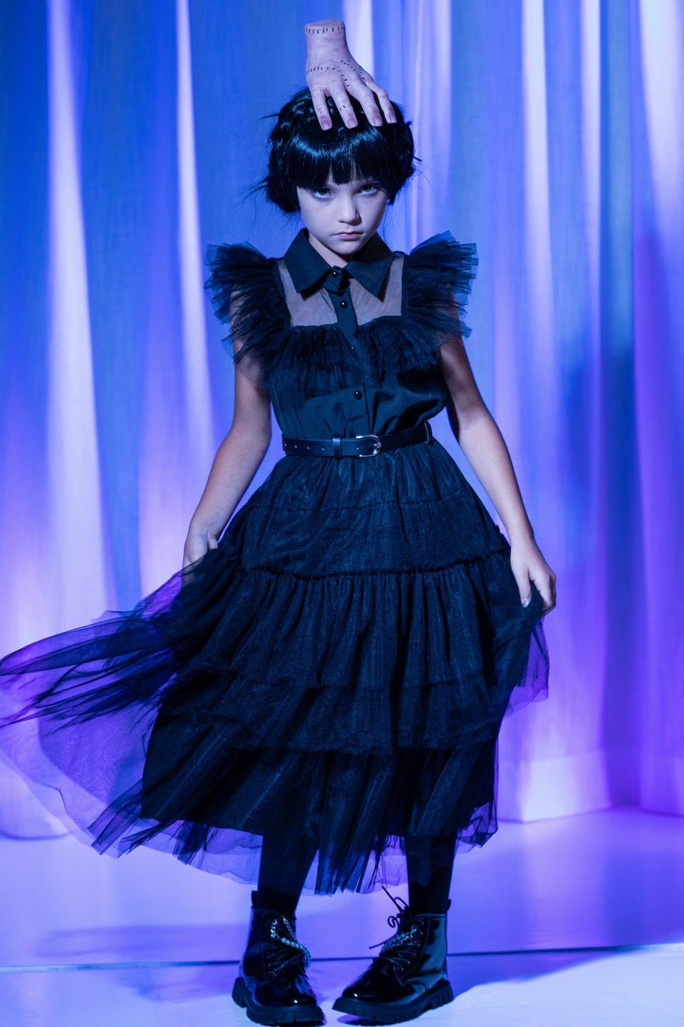 Shop our Wednesday Addams costume for girls featuring a spooky Nevermore-inspired black dress and accessories. Perfect for Halloween, parties and dress-up.